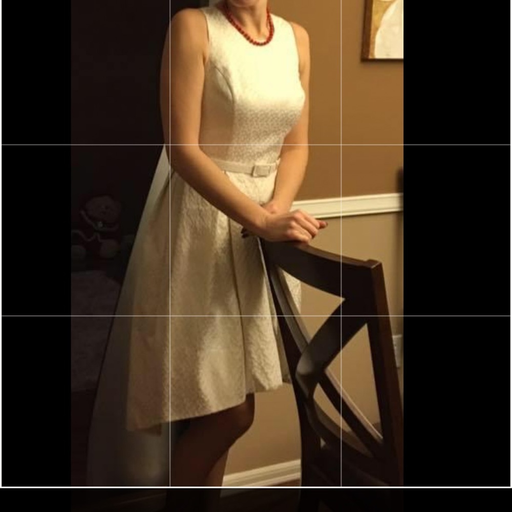 White House Black Marked MIDI dress. On the lining.  With a belt.  front shorter